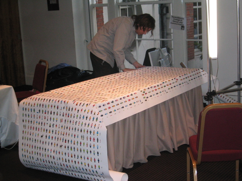 Jim Wood lays out the table cloth