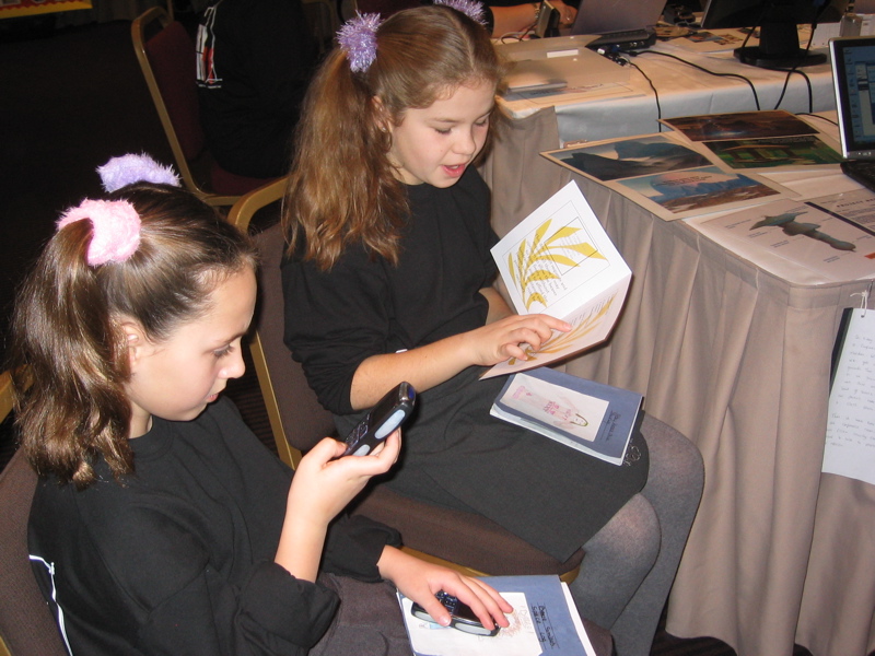 Children from Matching Green School using mobile phones as part of a Space Adventure!
