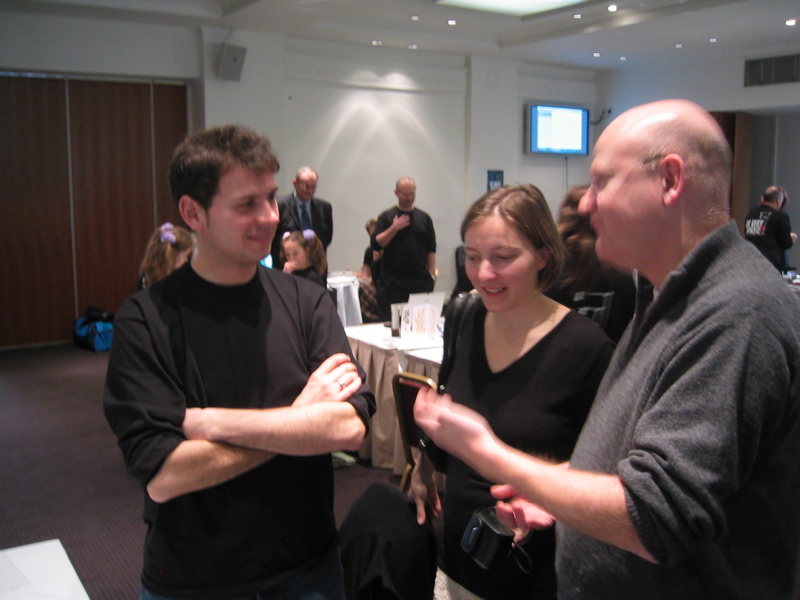 Bournmouth University student talking to Tilly Blyth and Andrew Chitty