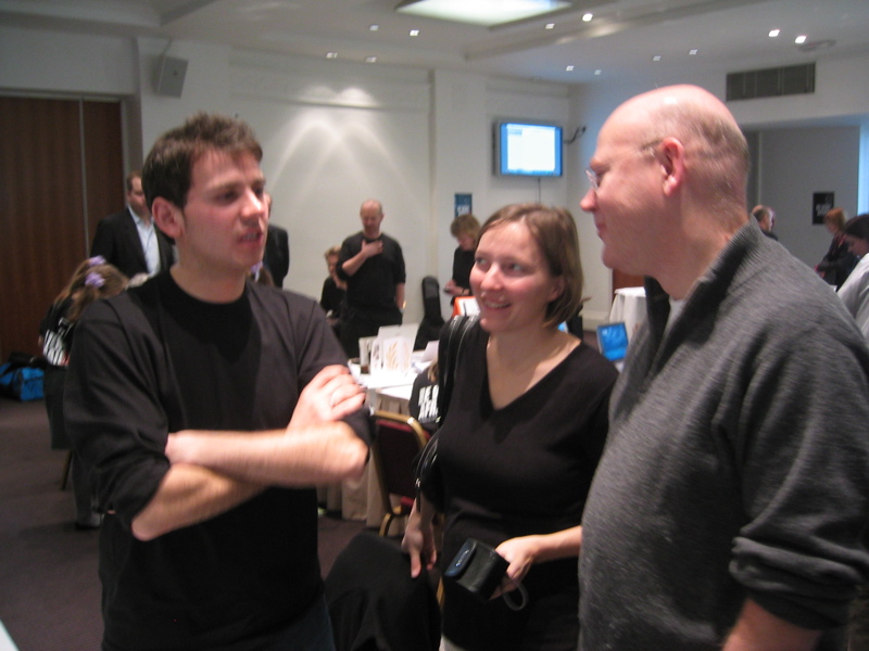 Bournmouth University student talking to Tilly Blyth and Andrew Chitty
