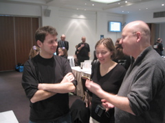 Bournmouth University student talking to Tilly Blyth and Andrew Chitty