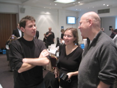 Bournmouth University student talking to Tilly Blyth and Andrew Chitty