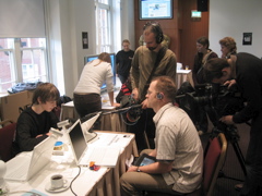 Film crew interviewing and asking Dan about his work