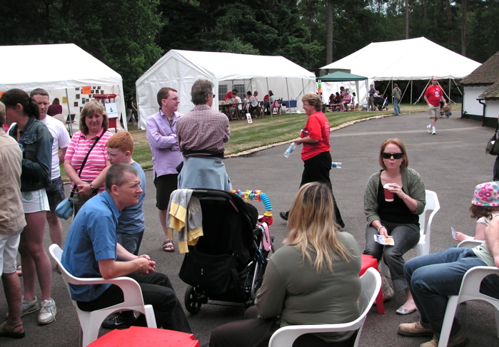 People enjoying eating and drinks from Café Guate