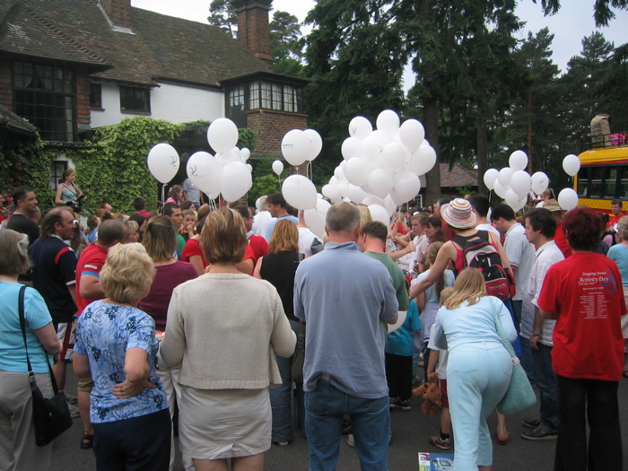 Balloons being handed out to children