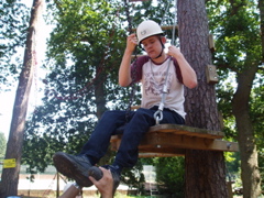 Dom makes it to the small zip line platform