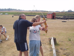 Archery... Ellie is one of the first to release an arrow