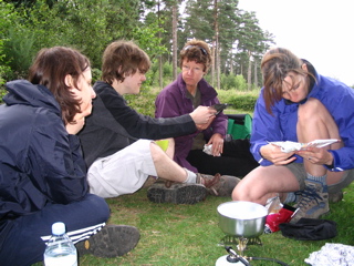 Pupils use trangias and gas for cooking a hot meal.