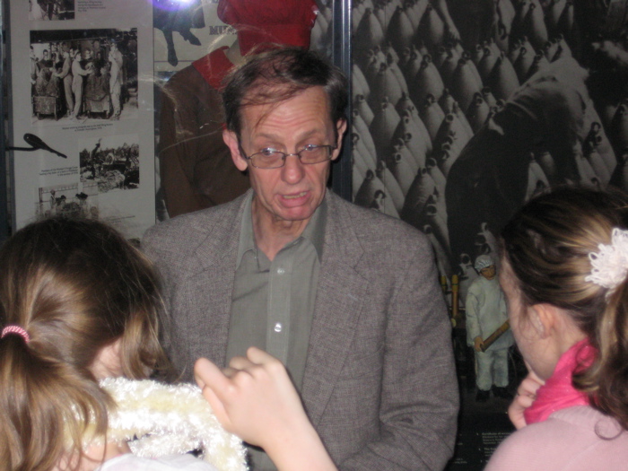 Neil recounts some of the World War I events to Amie and Amy.
