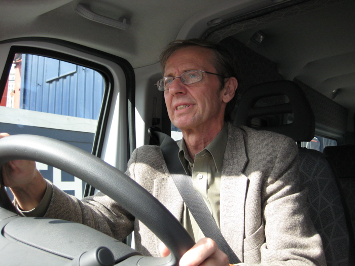 Neil drives us through the streets of London to the South Bank.