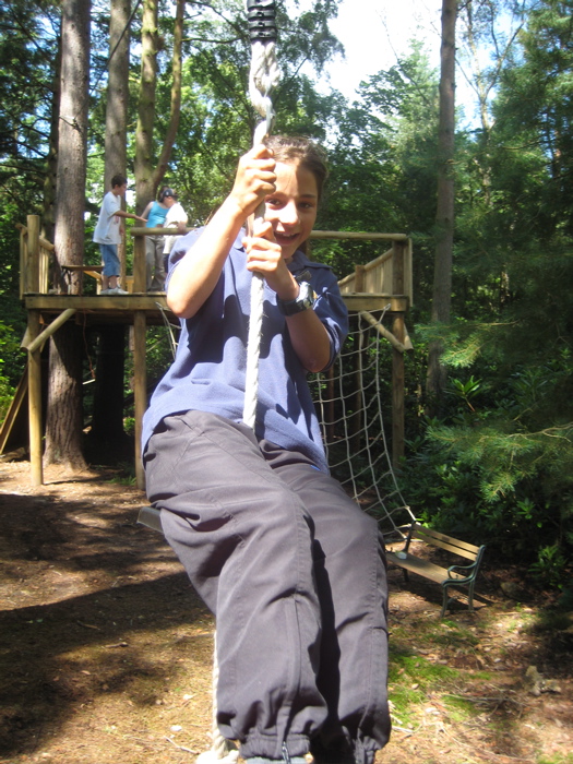 Lamorna rides the zip line 