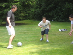 Alan lines up the shot, Ryan comes in to defend