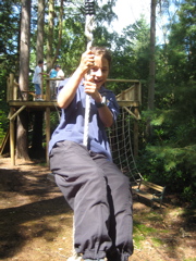 Lamorna rides the zip line 