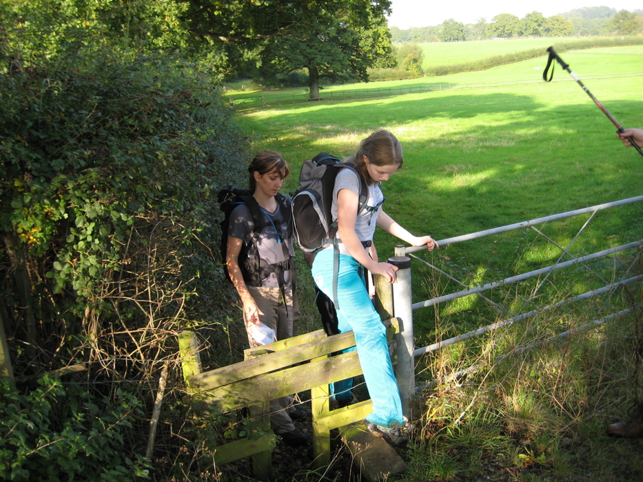 Amie takes care as she steps across - the wood is slippery.