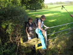 Amie takes care as she steps across - the wood is slippery.