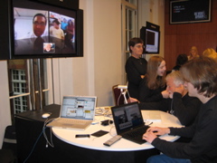 Dominic, Stephen, the Minister, and Arrowe chatting together.